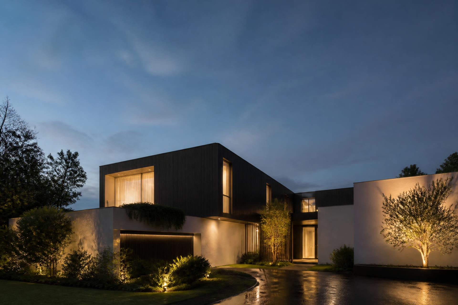 Modern Perth luxury home lit at dusk